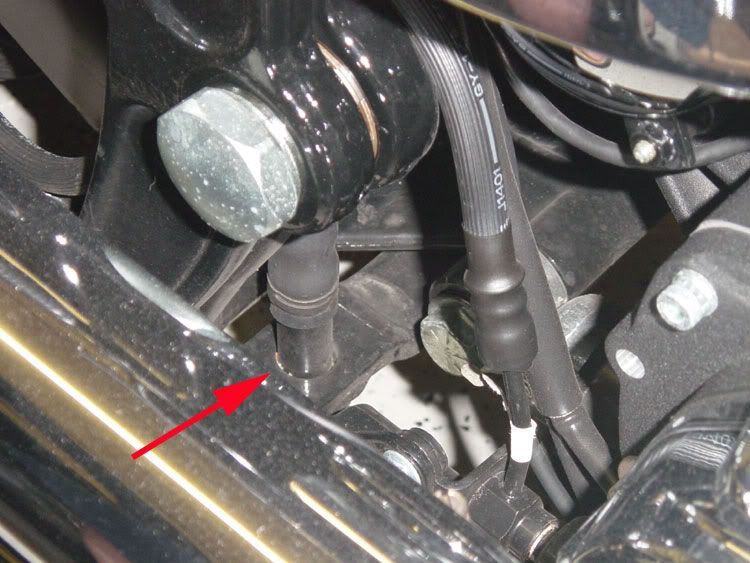 Where is the transmission drain plug on a 2004 heritage Fixya